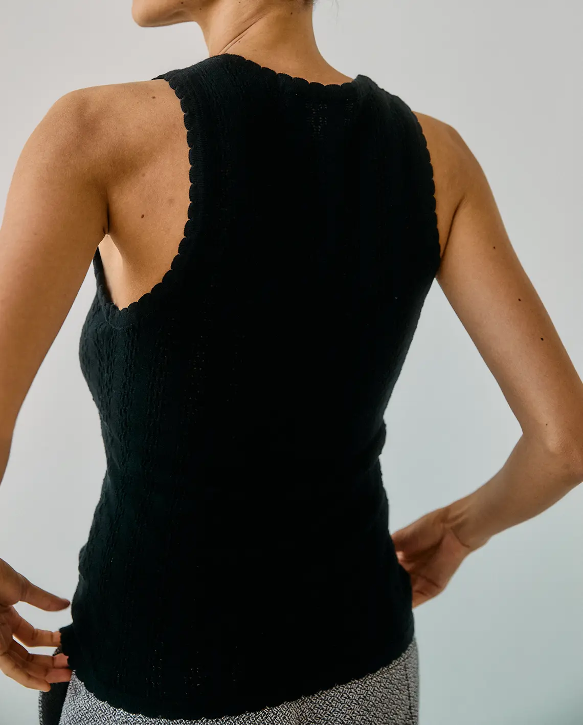 ProemParades_Nellie_Black_Tank_Top_Model_Back_LittleColumbine ProemParades_Nellie_Black_Tank_Top_Model_Back_LittleColumbine