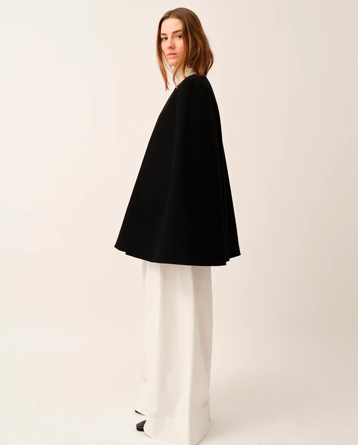 TheGarment_BalliCape_Black_Model_Side_LittleColumbine